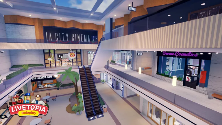 Mall storefronts, escalators and a cinema sign